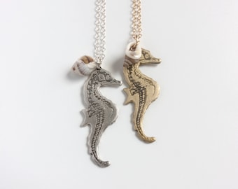 Silver or brass seahorse necklace, with etched skeleton and real seashell