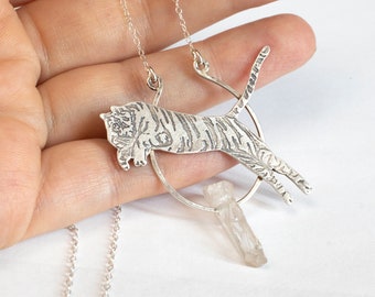 Etched Tiger Pendant in Oxidized Silver, Leaping Over a Crystal Point