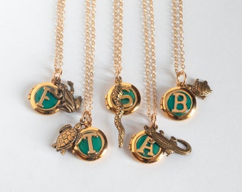 Personalized Initial Tiny Locket, with a reptile brass charm. Select Turtle, Tortoise, Snake, Frog, or Alligator.