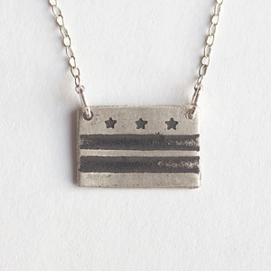 sterling silver washington DC flag necklace, on white background