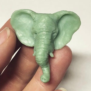 wax carving in progress for elephant head pendant