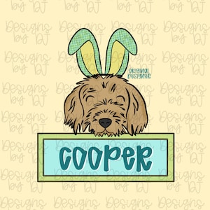 May include: A cartoon illustration of a dog wearing bunny ears. The dog has brown fur and a black nose. A light blue rectangle below the dog reads "COOPER" in teal script.