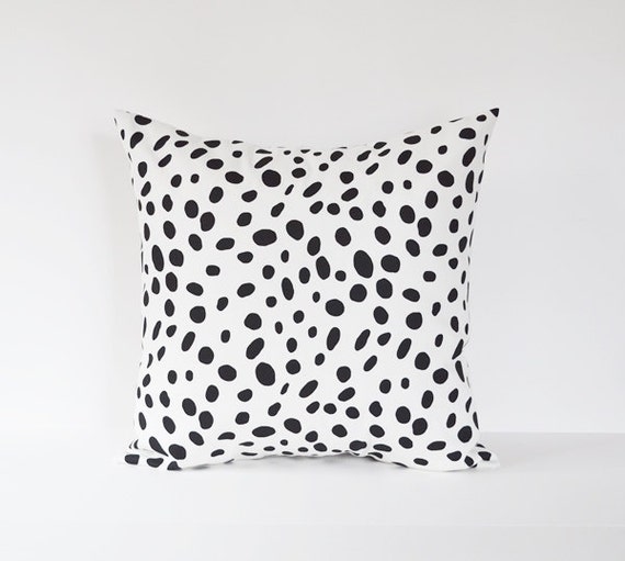 black and white spotted pillow