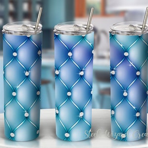 May include: Three stainless steel tumblers with a blue and white diamond pattern. The tumblers have a clear lid and a straw.