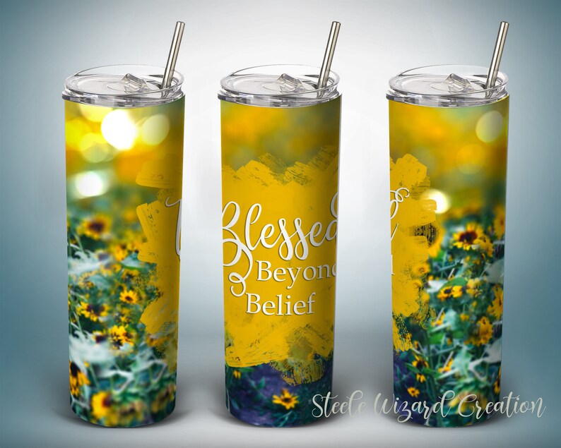 May include: A yellow stainless steel tumbler with a floral design and the text "Blessed Beyond Belief".