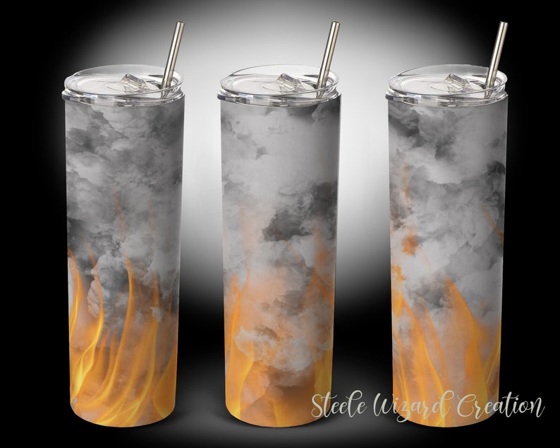 May include: Three stainless steel tumblers with a design of gray smoke and orange flames. The tumblers have lids and straws.
