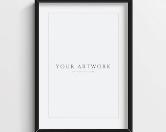 May include: A black picture frame with a white mat and the text "YOUR ARTWORK" and "NORTH MOCKUP GALLERY" in black.
