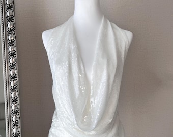 Top halter de lentejuelas estilo años 20: sin mangas y con la espalda descubierta, ideal para fiestas.