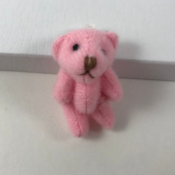 tiny pink teddy bear