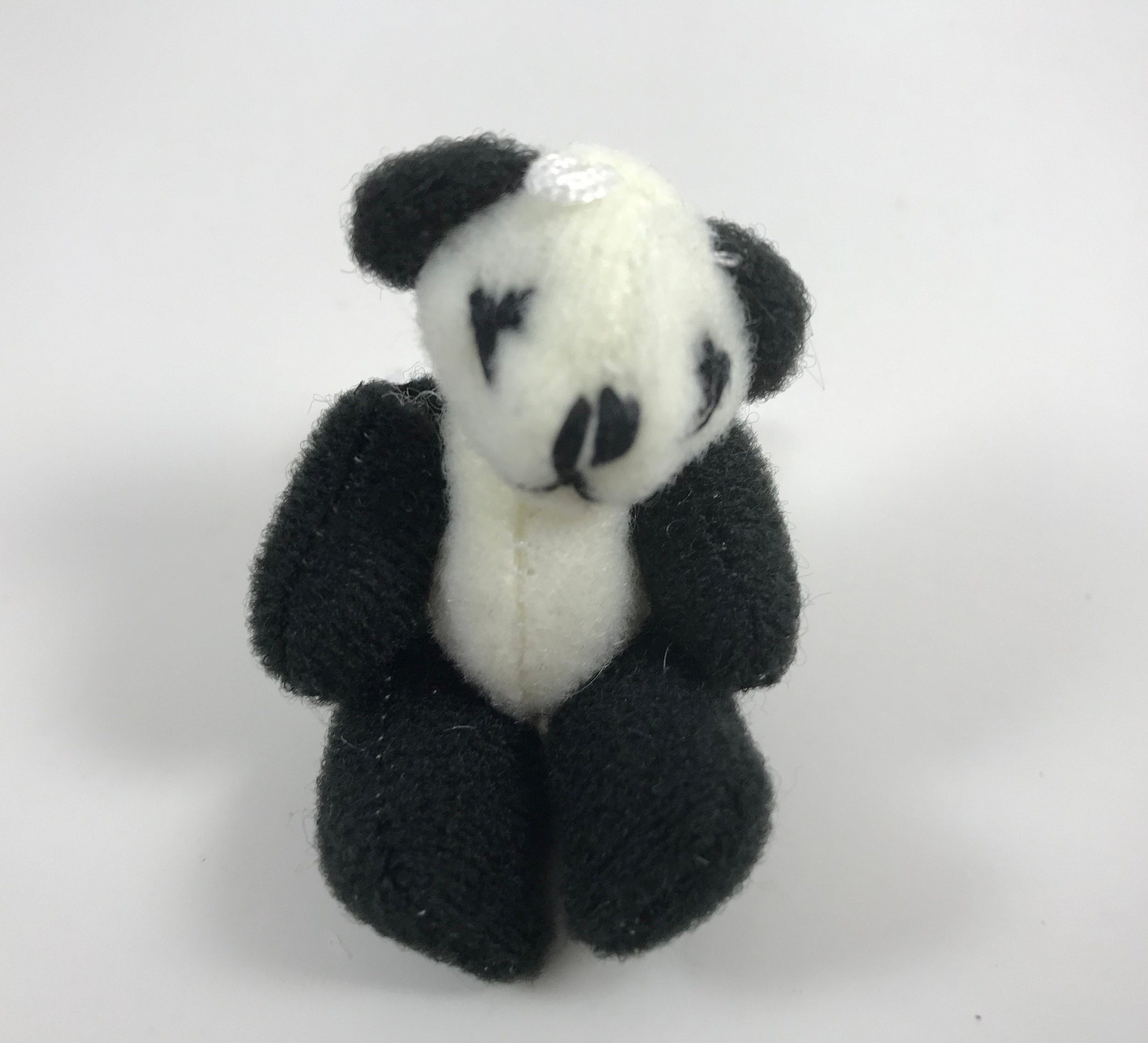 small stuffed panda