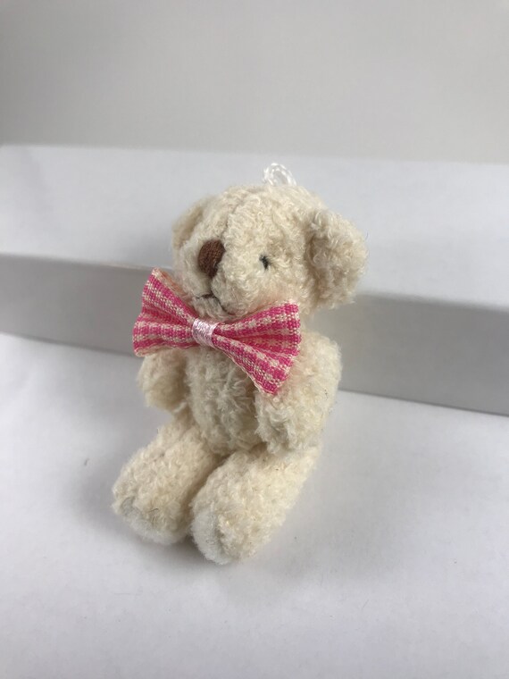 tiny red teddy bear