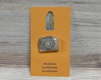 Camera pin