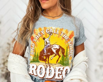 Rodeo Shirt And They Call the thing Rodeo Cowgirl Tshirt Western Graphic Western Clothes Howdy Shirt Yeehaw Tshirt Country Girl Cowboy Rodeo