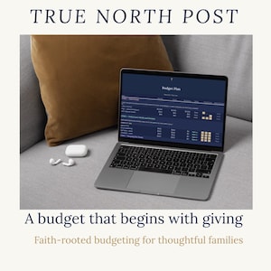 May include: A laptop displaying a budget plan on a dark blue screen, with the text "Budget Plan" at the top. The laptop is on a gray surface, with a brown pillow in the background. The text "TRUE NORTH POST" and "A budget that begins with giving" are also visible.