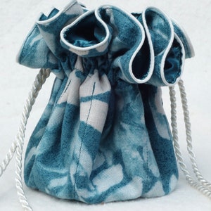 Teal blue photogram jewelry travel pouch bag