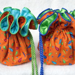 Jewelry Travel pouch in paisley confetti on orange