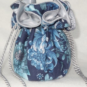 Blue and silver floral jewelry travel pouch