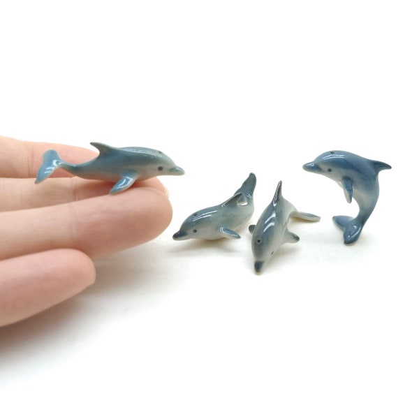 Lot de 4 dauphins, poissons, figurines en céramique, fines statues d'animaux miniatures