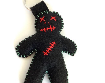 Black Felt Voodoo Doll with red and aqua stitching