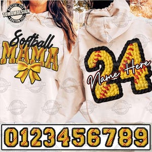 May include: White hoodie with "Softball Mama" text and a yellow bow. The back features the number "24" with space for a name. Includes a set of numbers 0-9 in a softball design.