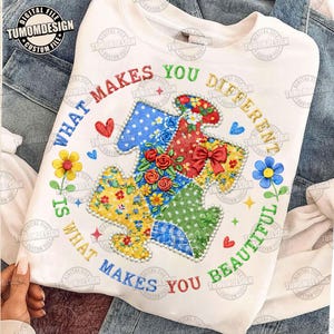 May include: A set of three ceramic mugs with a speckled, cream-colored glaze. Each mug features a different hand-painted floral design in shades of blue, green, and yellow. The mugs have a simple, rounded shape and a comfortable handle.