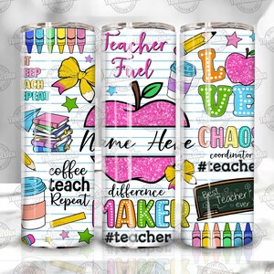 May include: A white tumbler with a school-themed design. The tumbler features colorful illustrations of pencils, crayons, books, and apples, along with text like "Teacher Fuel" and "Love Chaos". The design is set against a lined paper background.
