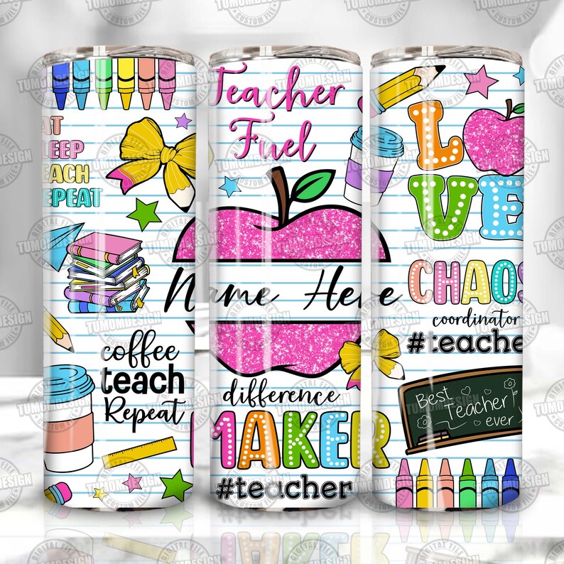May include: A white tumbler with a school-themed design. The tumbler features colorful illustrations of pencils, crayons, books, and apples, along with text like "Teacher Fuel" and "Love Chaos". The design is set against a lined paper background.