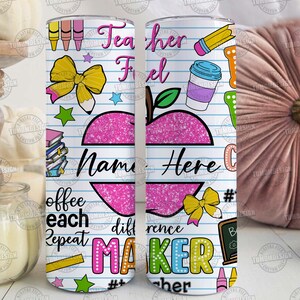 May include: A white tumbler with a school-themed design. It features a pink apple with the text "Name Here", along with colorful illustrations of pencils, crayons, and the words "Teacher Fuel" and "Difference Maker".