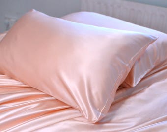 Taie d'oreiller de luxe en soie de mûrier de qualité 6A des deux côtés de 25 momme (le prix est pour une taie d'oreiller)