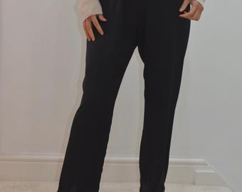 Pantalones de seda con dobladillo de encaje