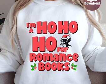 May include: White sweatshirt with red text that says "I'm a Ho Ho Ho for Romance Books". The text is in a bold, playful font. A small red and white Santa hat with a cupid holding a bow and arrow is above the word "for".