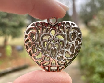 Filigree Heart pendant. Hollow, antique silver. Reversible.