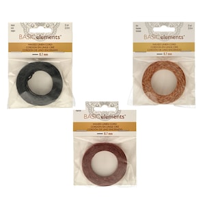 May include: Three spools of waxed linen cord in black, brown, and red. Each spool is labeled "BASIC elements" and "WAXED LINEN CORD" with the text "0.7 mm" printed below.