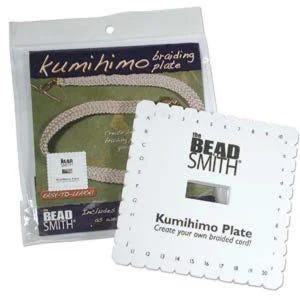 May include: White plastic Kumihimo braiding plate with the text "The Bead Smith" and "Kumihimo Plate Create your own braided cord!"  The plate has numbered holes around the perimeter.