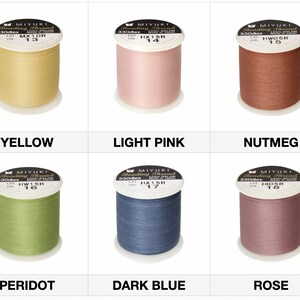 May include: Six spools of Miyuki beading thread in various colors: yellow, light pink, nutmeg, peridot, dark blue, and rose. Each spool is labeled with the color name and product information. The thread is 100% nylon.