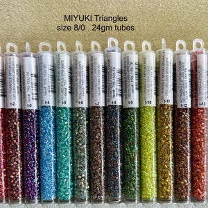 8/0 Triangles Miyuki seed beads, 24g tubes. Japanese. 13 colors/finishes.