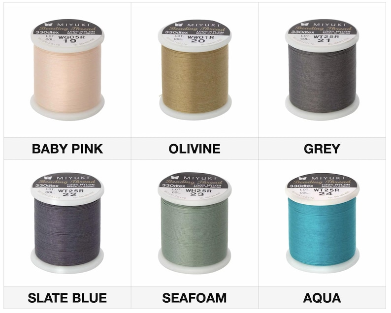 May include: Six spools of Miyuki beading thread in various colors: baby pink, olivine, grey, slate blue, seafoam, and aqua. Each spool is labeled with the color name and product information. The thread is made of nylon and is 330 dtex.