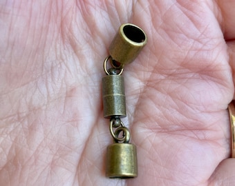 5.8mm end caps with bronze brass magnetic clasp. Cylinder shaped caps & clasp. Strong magnetic clasp.