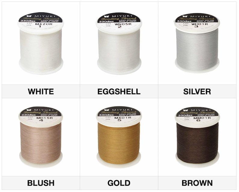 May include: Spools of MIYUKI beading thread in various colors: white, eggshell, silver, blush, gold, and brown. Each spool is labeled with the color name and product information. The thread is 330dtex nylon.