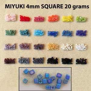 May include: A collection of Miyuki 4mm square beads in 20 grams, organized in twenty-four distinct color piles. The beads are arranged in four rows of six, with a large inset box showing a close-up of iridescent blue square beads.