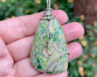 Lime Green imperial jasper wire wrapped pendant reversible. Cord included.