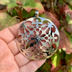 3 Filigree Floral Snowflake Pendants. 2 3/8 inches across. Platinum plated with bail. Convex curve. Set of 3.