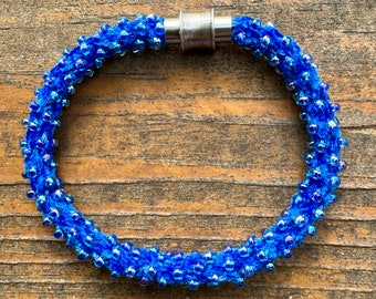 Speckled Beaded Bracelet. Rayon Chenille 16-strand Kumihimo braid. 5.8mm stainless steel clasp. Color choices.