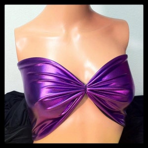 May include: A purple iridescent bandeau top with a knotted detail in the center.