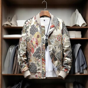 May include: A beige bomber jacket with a floral print featuring red, yellow, and blue flowers. The jacket has a zipper closure and a ribbed collar, cuffs, and hem.