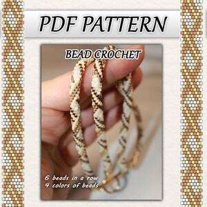 May include: Image of a PDF pattern for bead crochet. The image shows three beaded bracelets in cream, brown, and gold. The text on the image says "PDF PATTERN" and "BEAD CROCHET". The image also says "6 beads in a row, 4 colors of beads."