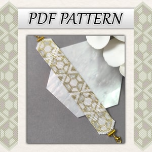 May include: A beaded bracelet with a geometric pattern in white and gold. The bracelet is displayed on a white, textured surface. The image includes the text "PDF PATTERN" in a white box at the top.