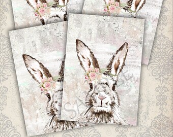 May include: Four digital printable images of a watercolor bunny with a floral crown. The bunny is white with brown ears and a brown nose. The background is a light gray with a whitewash effect. The text "www.countryatheart2008.etsy.com" is at the top of the image.