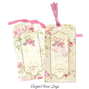 K&ouml;nnte beinhalten: Zwei rosa und wei&szlig;e Geschenkanh&auml;nger mit Blumenmuster und dem Text "CHOCOLAT" und "MAGNIEZ BAUSSART AMIENS". Die Anh&auml;nger sind 5,1 cm x 10,2 cm gro&szlig;.