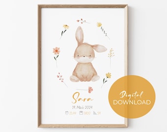 May include: A framed watercolor print featuring a seated brown bunny surrounded by flowers. The print includes the name "Sara", date, time, and weight. A gold circle with the words "Digital Download" is in the lower right corner.